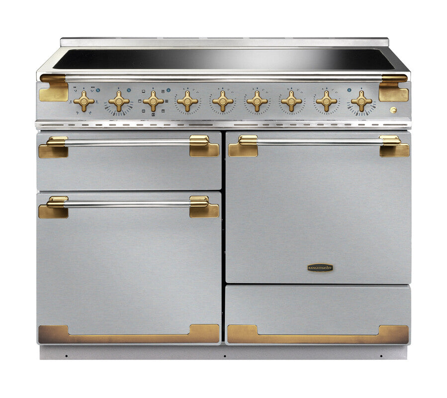 Rangemaster Elise Luxe 110cm induction cooker with stainless steel body and antique brass handles and knobs.