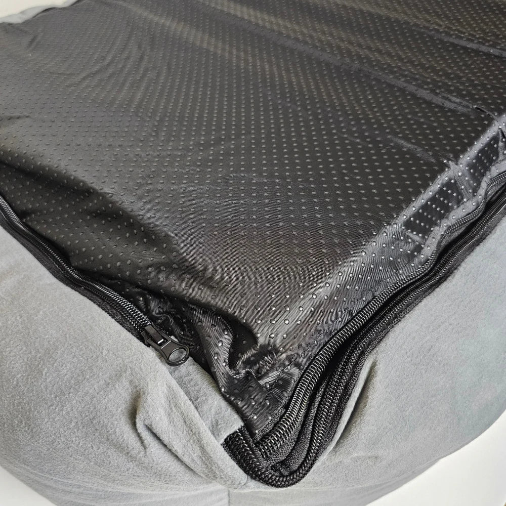 Close-up of the Alice & Co Orthopaedic Dog Bed Chester showing the textured black non-slip base and zipper edge.