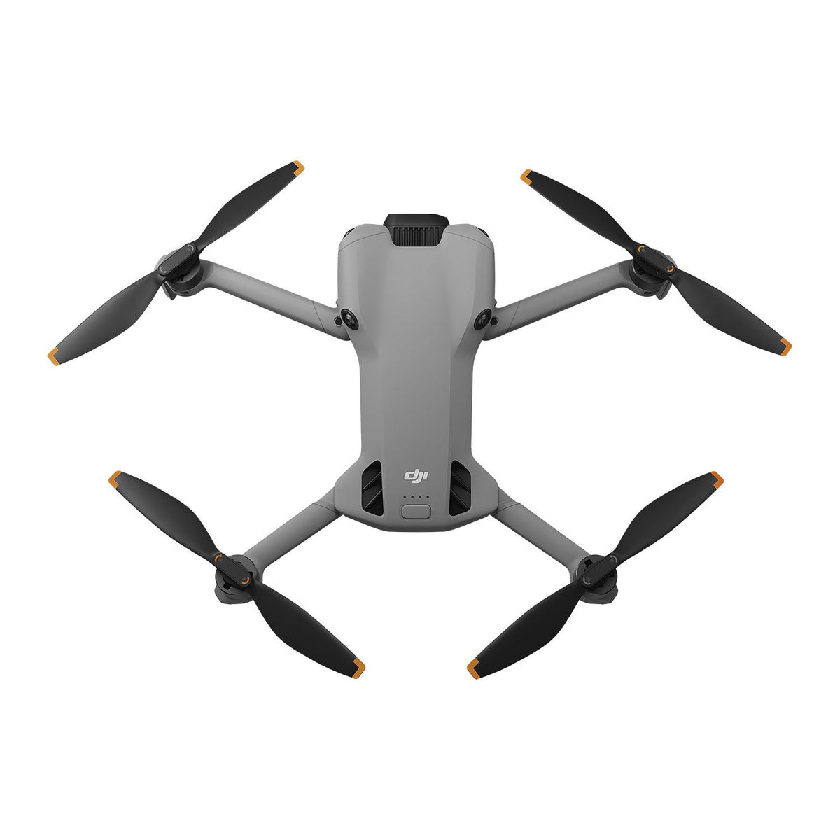Top view of DJI Mini 5 Pro drone with four black propellers and gray body showing DJI logo and battery indicator