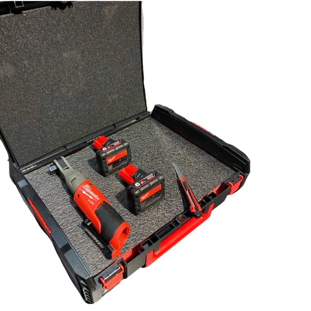 Open Milwaukee DYNA Case tool storage box with foam insert holding a cordless tool, two batteries, and a knife.