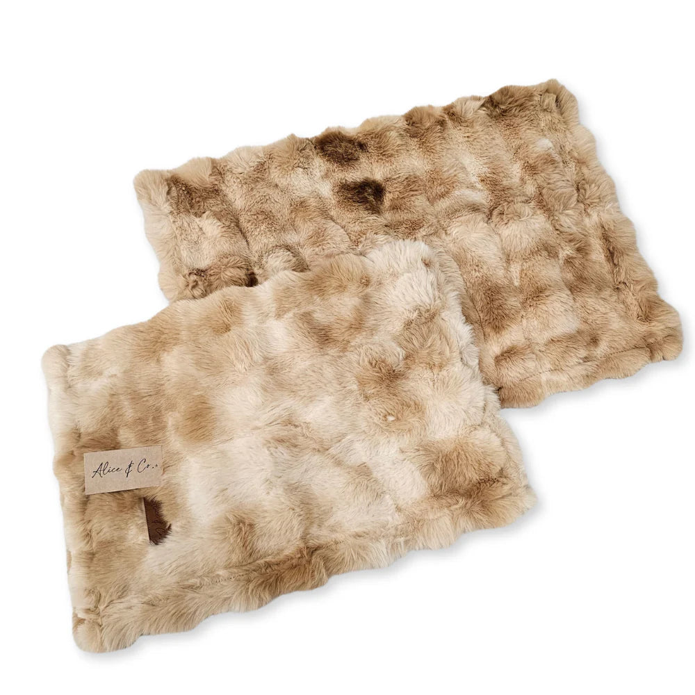 Two soft, rectangular Cat & Dog Blankets in beige and brown pepper latte tones with a fabric tag.