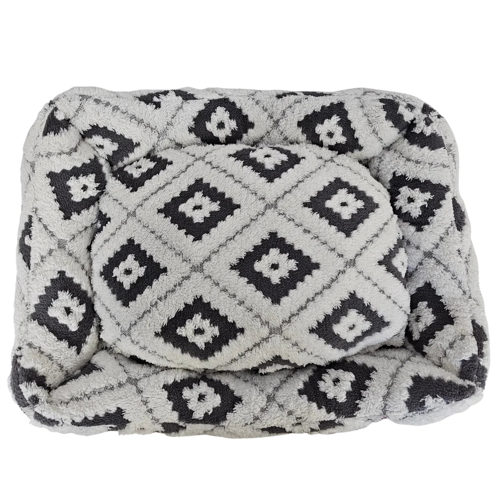 Wiggle & Wander Boho Grey dog bed with raised edges and a black and white diamond pattern