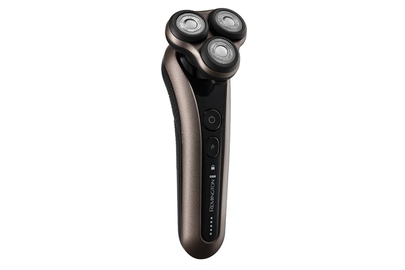 Remington Mens Cordless Shaver X9 shown front three-quarter with three rotary blades and control buttons.