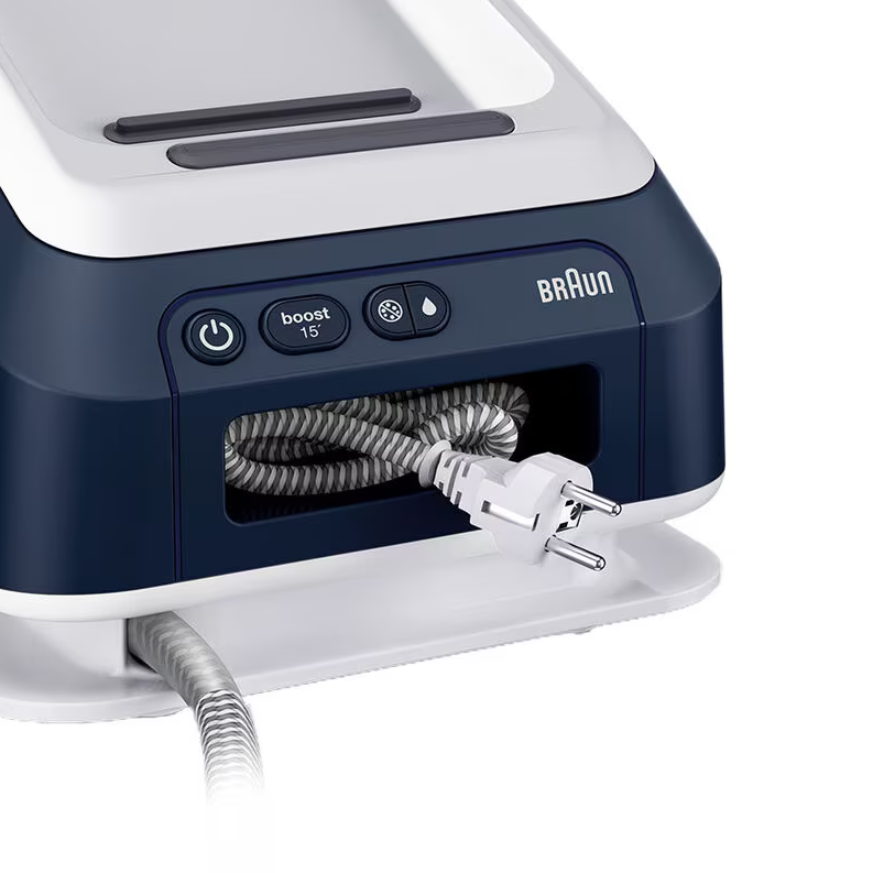 Close-up of Braun Steam Generator Iron base showing power and function buttons and coiled power cord storage.
