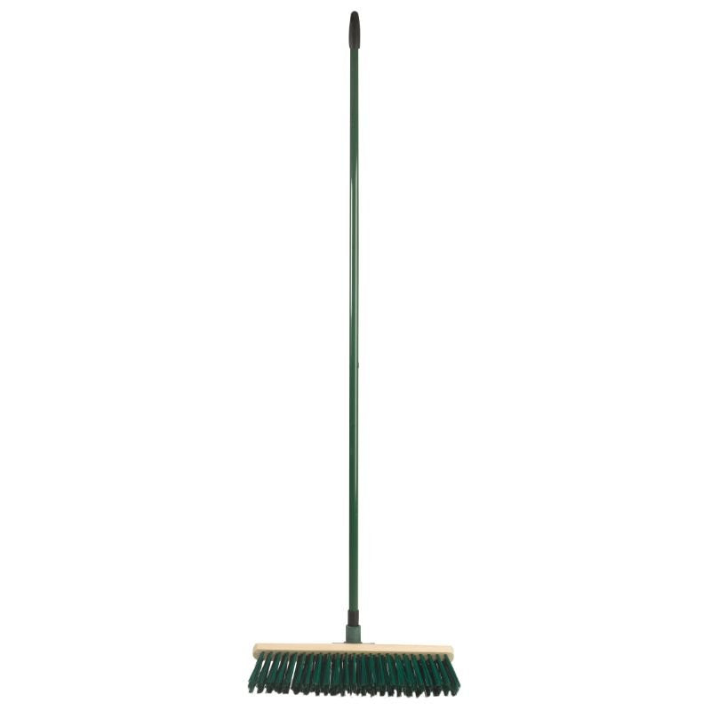 45cm yard broom with green bristles and long green handle with black grip tip, standing upright on white background