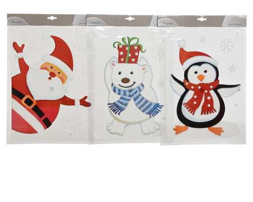 Three PVC flock window decorations showing Santa, a polar bear with a gift, and a penguin wearing a scarf and hat.