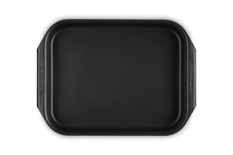 Le Creuset Black Roasting Tin 27x23cm for oven cooking - durable cast iron bakeware | Keans Claremorris