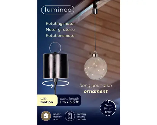 Product packaging for the Lumineo rotating motor pendant light ornament, showing a black cylindrical hanging ornament on the left and a clear spherical ornament on the right against a dark blue background with product features and icons.