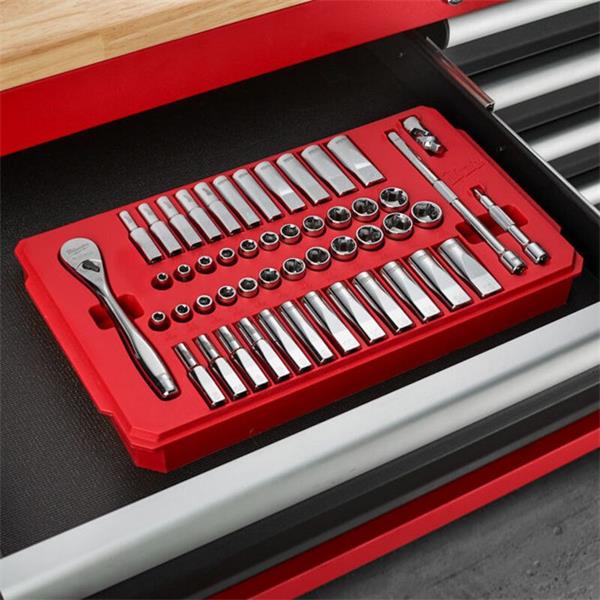 Milwaukee 1/4" driver ratchet and 50-piece metric and imperial sockets in red tray inside a tool drawer.