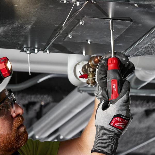 Person wearing gloves using Milwaukee 14 in 1 Multi-Bit Screwdriver to tighten screws overhead