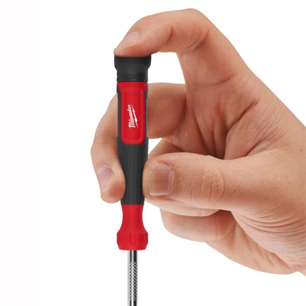 Hand holding Milwaukee 27 in 1 Multi-Bit Screwdriver with red and black handle and visible logo