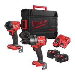 Milwaukee power tool set with drill, impact driver, and battery pack on a white background