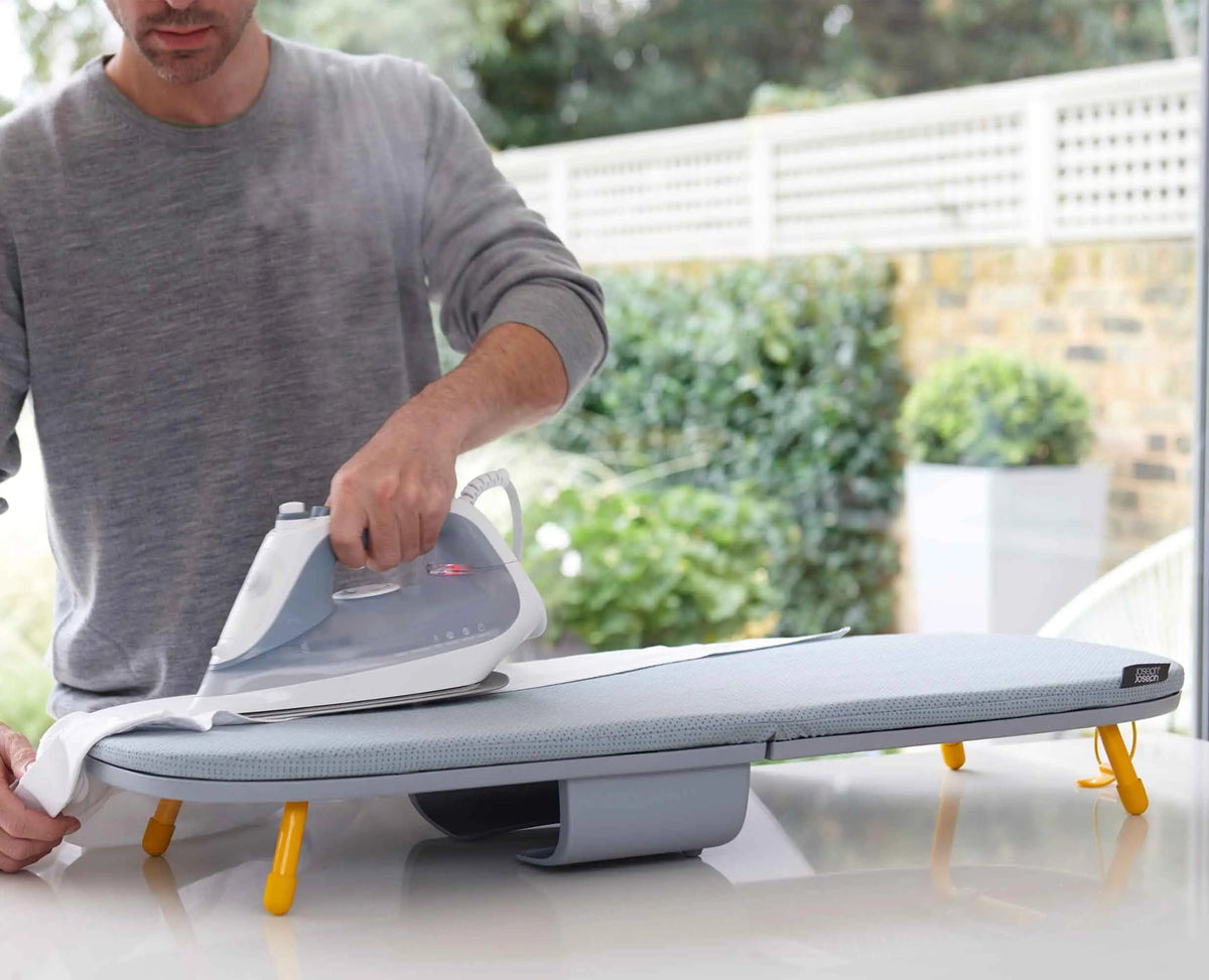 Joseph Tabletop Ironing Board with folding design, iron storage, hanging hook, cotton cover – compact space saver at Keans