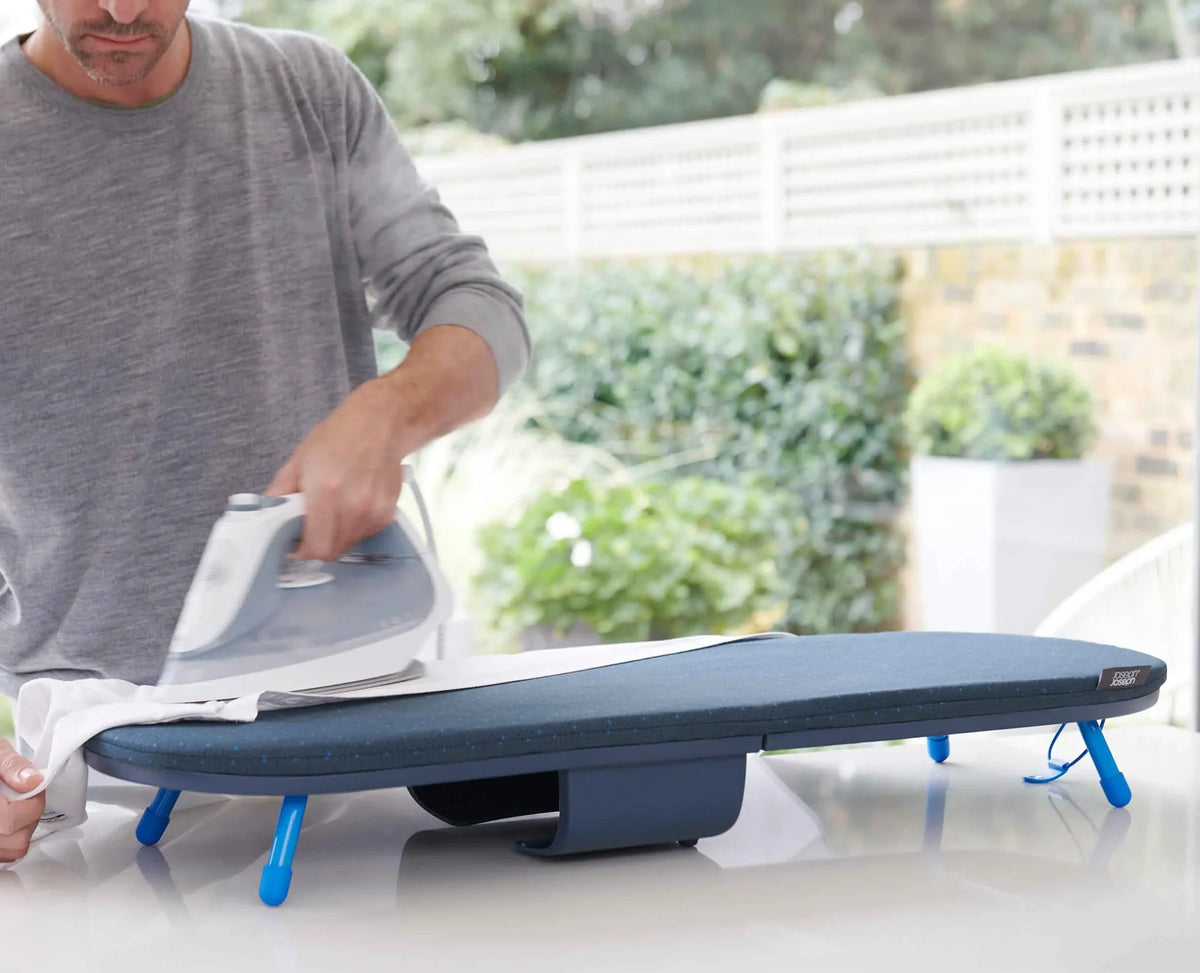 Pocket Plus Folding Blue Ironing Board with DripLock™ cover, iron storage, wall mount – available at Keans Claremorris