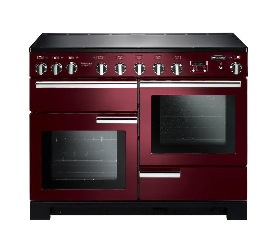 Rangemaster Professional Deluxe 110 induction cooker in burgundy with two ovens and multiple control knobs