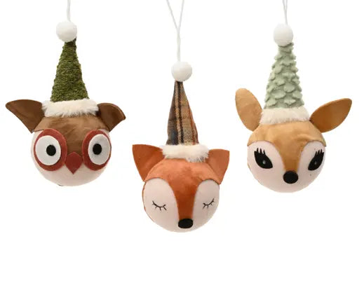 Three plush hanging ornaments shaped like an owl, fox, and deer, each wearing a small festive hat, shown on a plain white background.