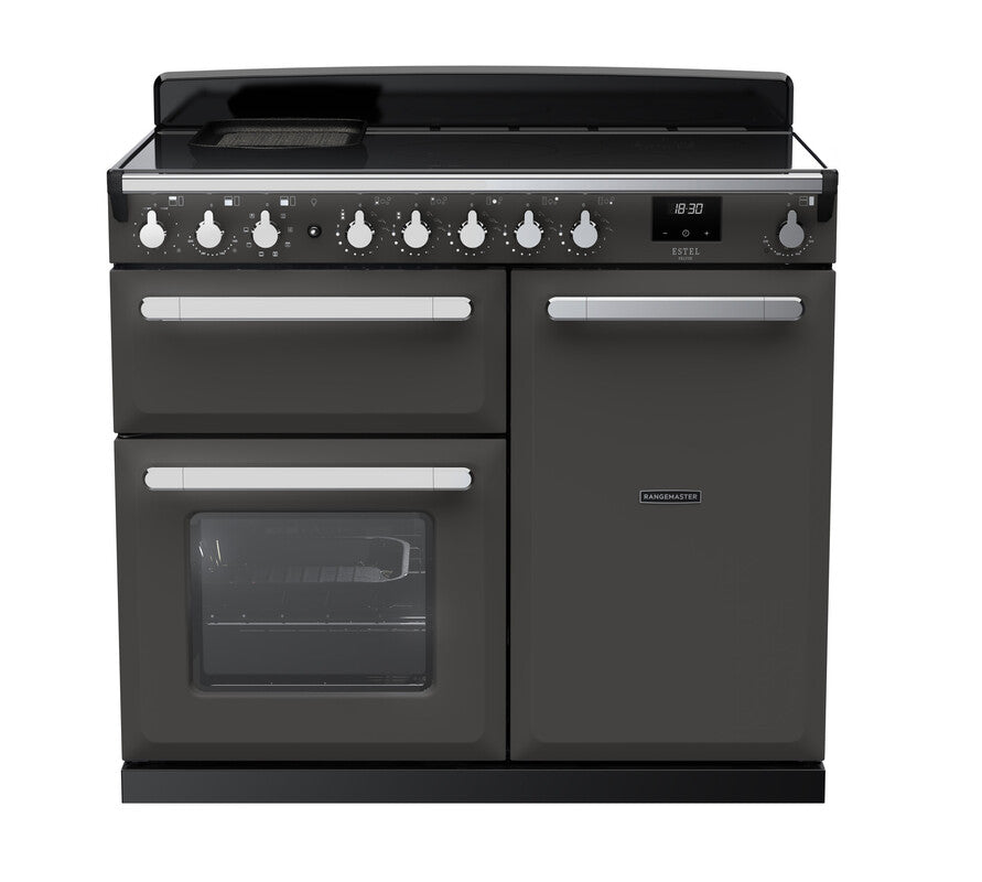 Rangemaster Induction Estel Deluxe 100cm cooker in black with chrome trim, multiple knobs, and digital clock display