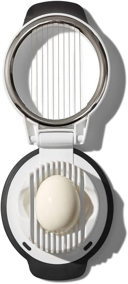Oxo Egg Slicer with stainless steel wires for even slicing, perfect for salads and snacks – available at Keans Claremorris.