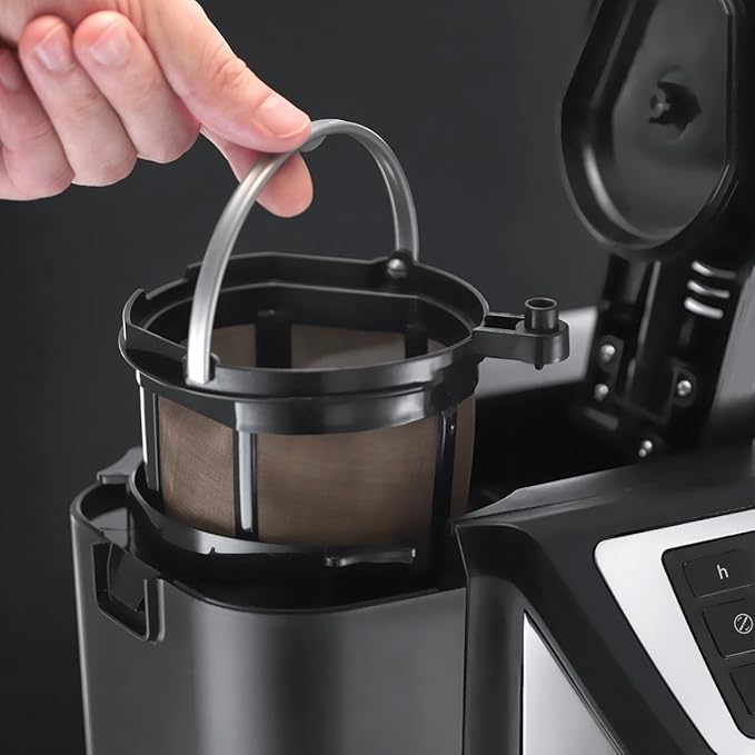 Hand lifting the removable coffee filter basket from the Russell Hobbs Chester Bean to Cup coffee maker.