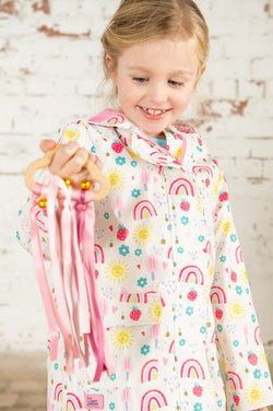 Heidi Girls Coat Rainbow Sunshine with vibrant colors, warm fabric – available at Keans Claremorris.