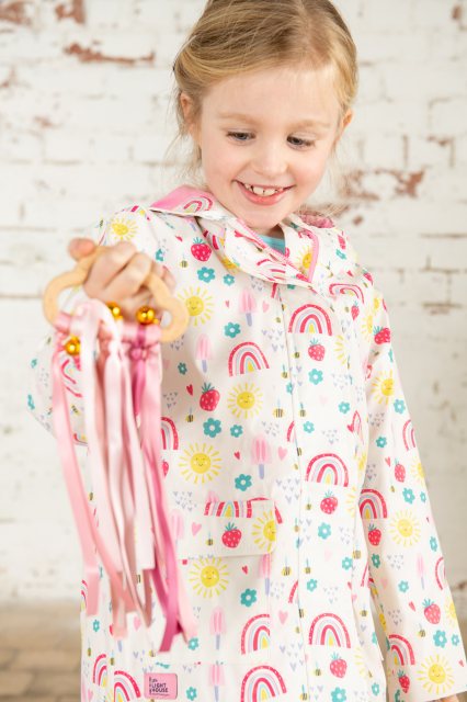 Heidi Girls Coat Rainbow Sunshine with vibrant colors, warm fabric – available at Keans Claremorris.