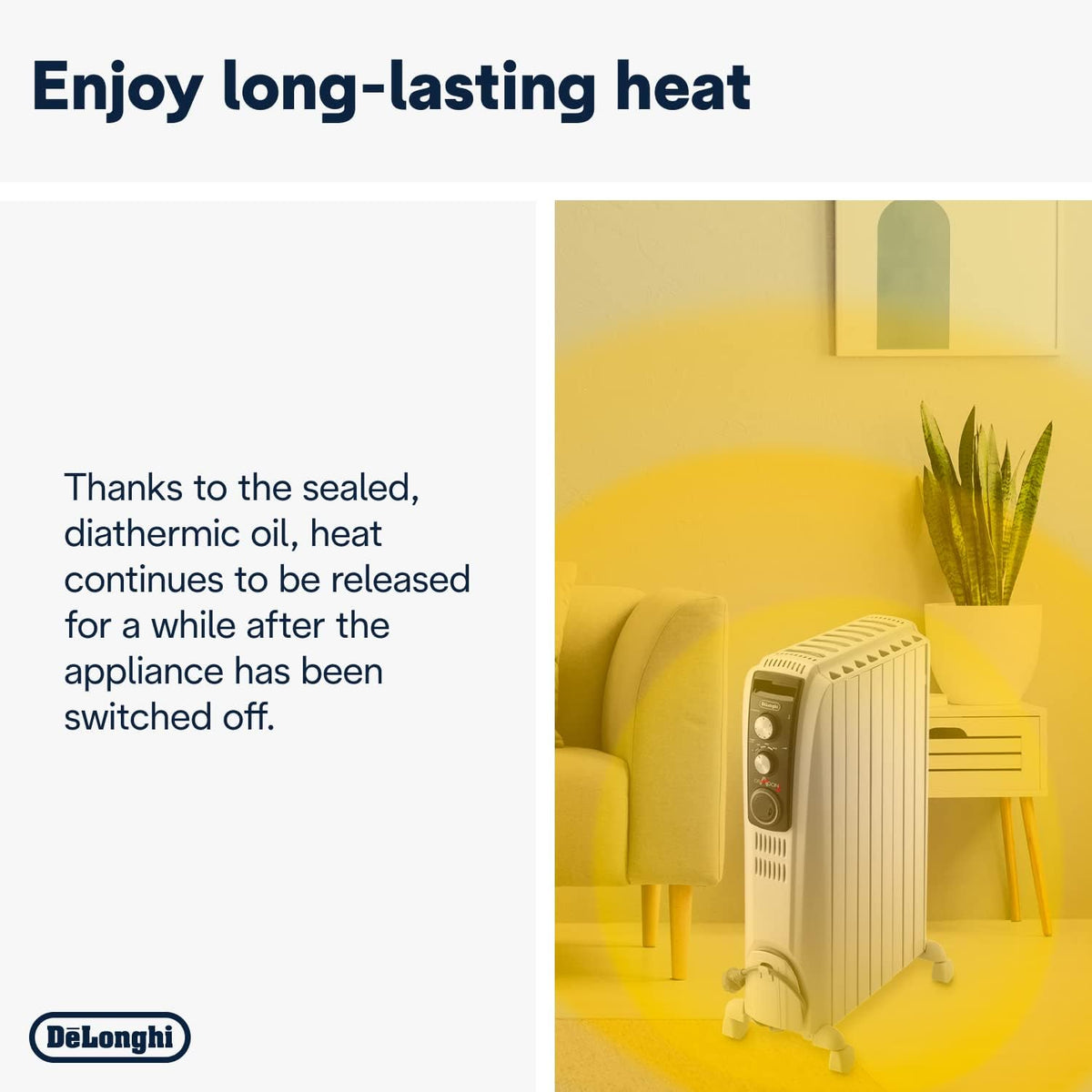 DeLonghi 2kw oil filled radiator standing on wheels in a living room next to a beige armchair and plant.