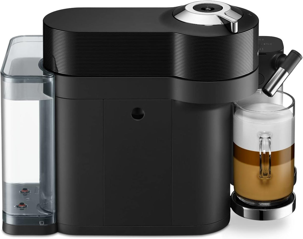 Delonghi Nespresso Vertuo Lattissima black coffee machine with milk frother and glass of layered latte.