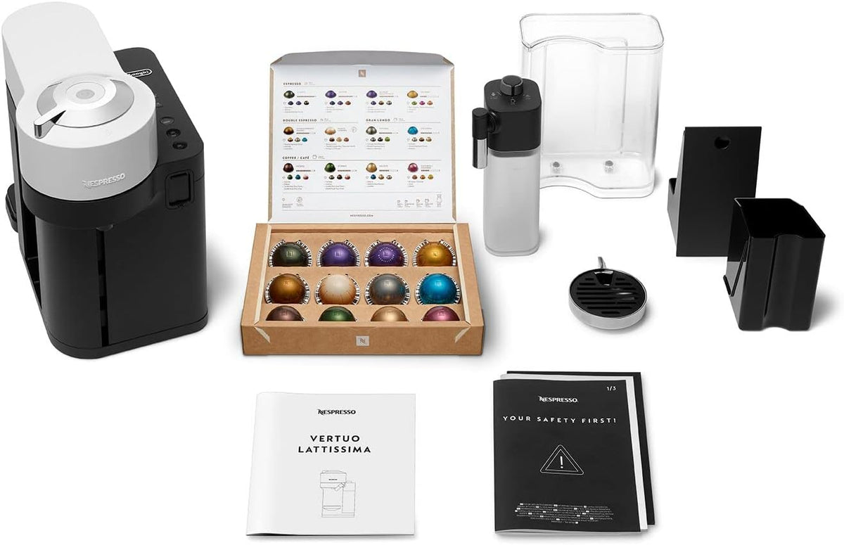 Delonghi Nespresso Vertuo Lattissima coffee machine with milk frother, capsules, water tank, and manuals.