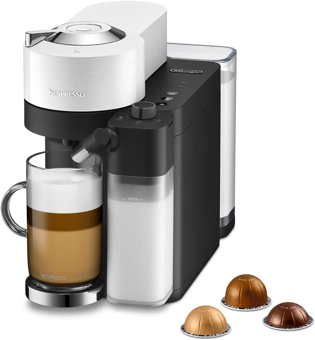Delonghi Nespresso Vertuo Lattissima coffee machine in white with milk frother and glass of layered coffee.