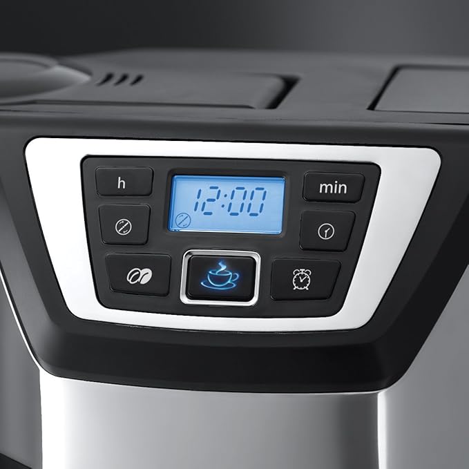 Close-up of the Russell Hobbs Chester Coffee Maker bean-to-cup control panel with digital clock display.