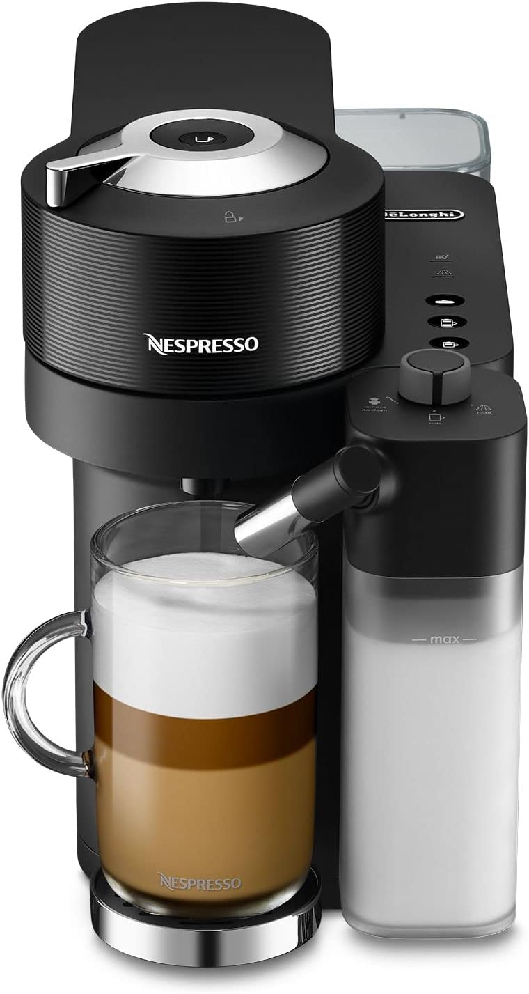 Delonghi Nespresso Vertuo Lattissima black coffee machine with milk frother and glass of layered latte.