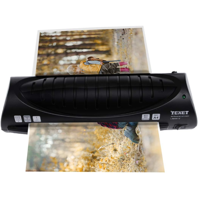 Texet A4 Laminator in black laminating a photo of a child in autumn outdoors.