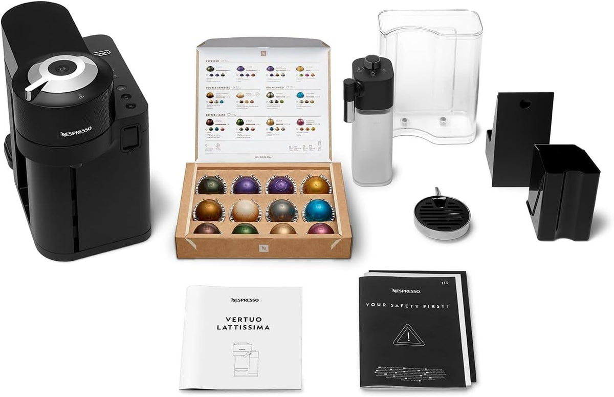 Delonghi Nespresso Vertuo Lattissima black coffee machine with milk frother, capsules, water tank, and manuals.