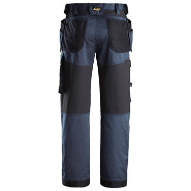 Back view of Snickers 6251 navy and black stretch loose fit work trousers with holster pockets.