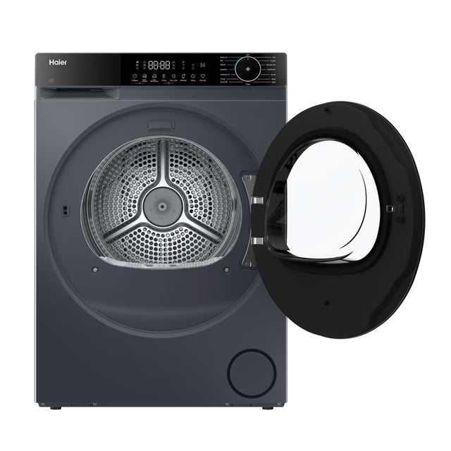 Haier 9kg graphite heatpump tumble dryer with open door showing stainless steel drum and control panel.