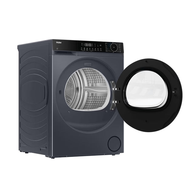 Haier 9kg graphite heatpump tumble dryer with open door showing stainless steel drum and control panel.
