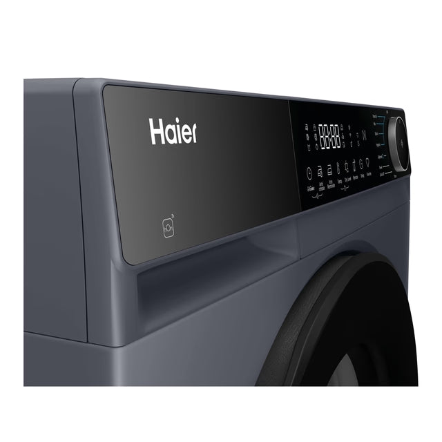 Close-up of the control panel and door of the Haier 9kg graphite heatpump tumble dryer.