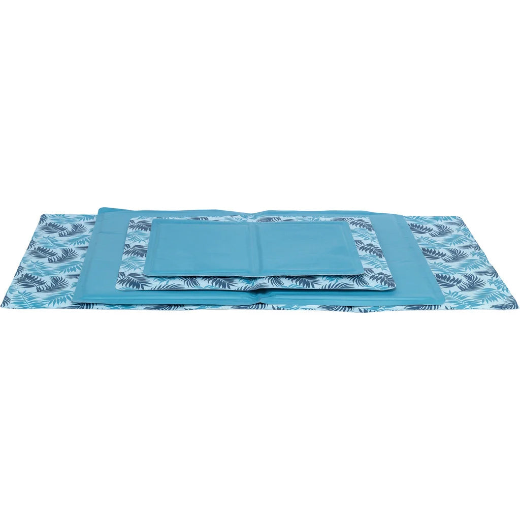 Three blue cooling mats with palm leaf patterns in small, medium, and large sizes stacked flat.