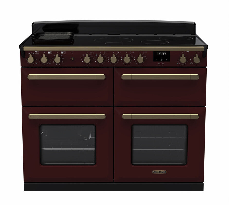 Rangemaster Estel Deluxe 110cm slow cook oven in deep burgundy with antique brass handles and trim, induction hob on top.
