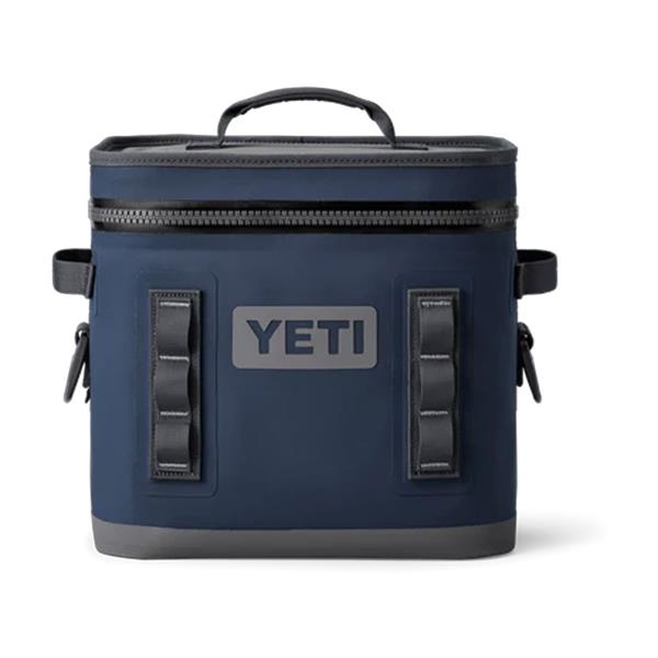 Navy YETI Hopper Flip 12 soft cooler with top handle, front loops, and gray base.