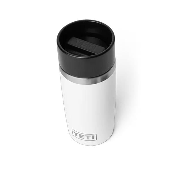 White Rambler 12oz travel bottle with black lid and YETI logo on the front