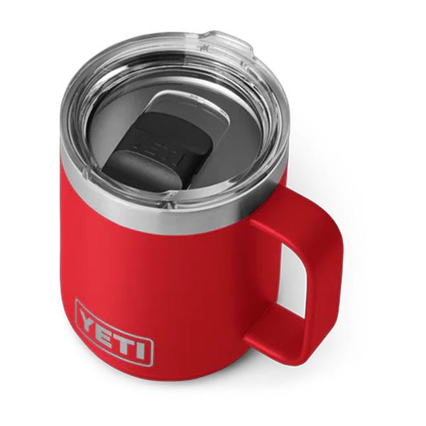 Rambler 10oz mug in rescue red with clear lid and black flip closure, angled top view.