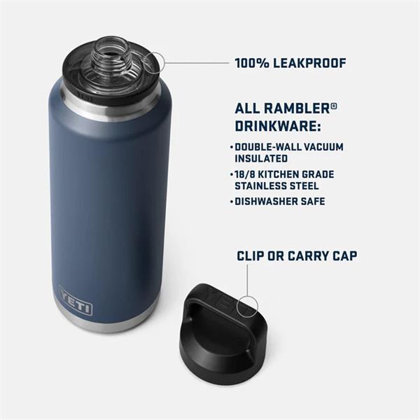 Navy Rambler 46oz bottle with open top and separate black clip carry cap on white background