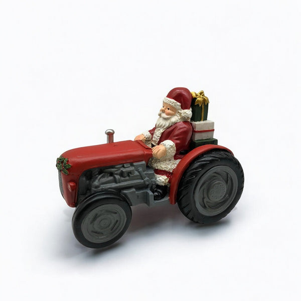 Santa in Traditional tractor 17x11x13cm