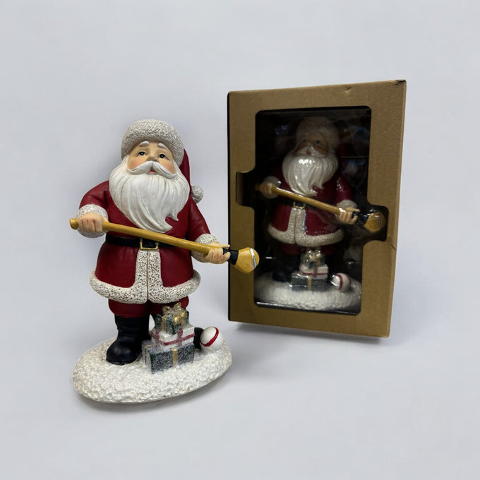 Santa with Hurling Stick 10x8x15cm - Image 1