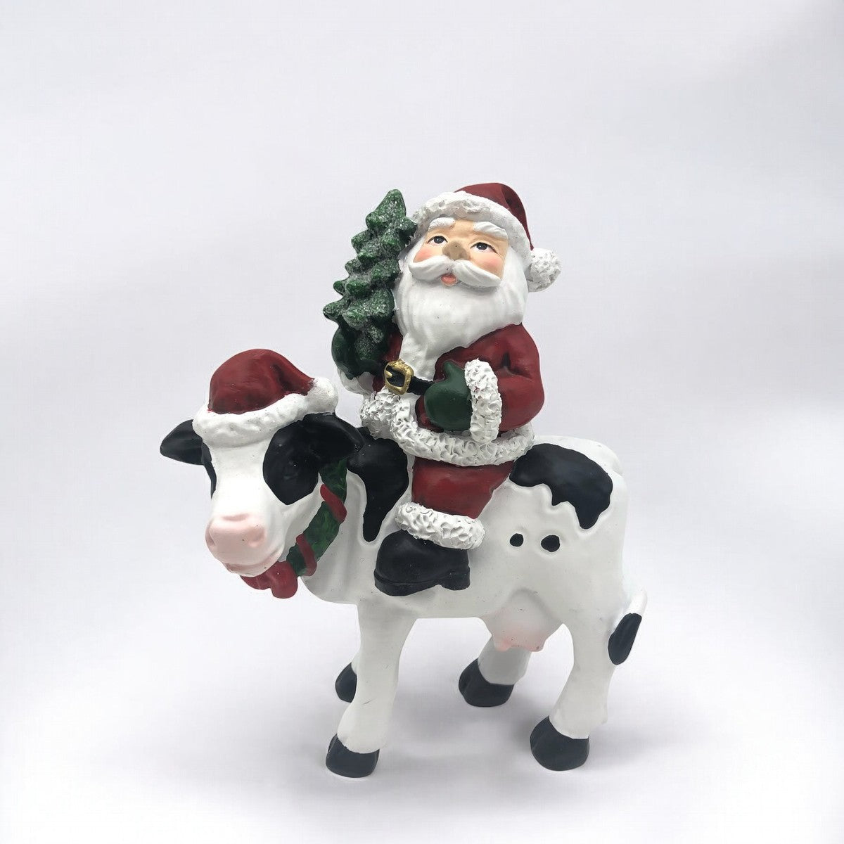 Santa on cow with Christmas Tree 12x6x17cm - Image 1