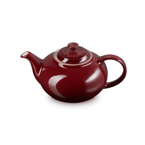 Le Creuset Stoneware Classic Teapot 1.3L in Garnet red, durable and stylish, available at Keans Claremorris.