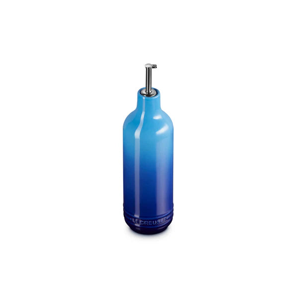 Le Creuset Oil Creut in azure blue stoneware with stainless steel pourer, 600ml capacity.