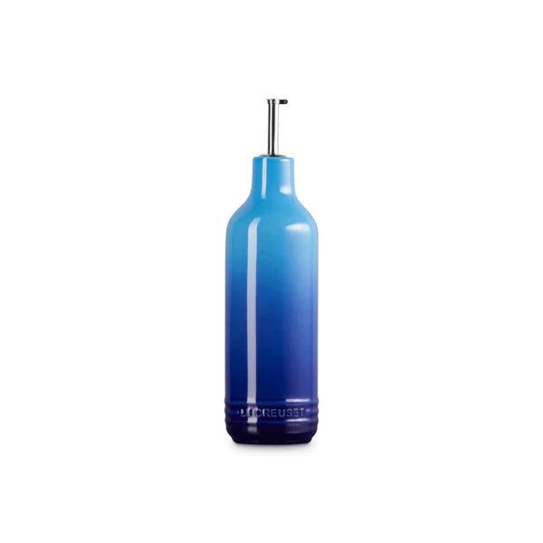Le Creuset 600ml oil cruet in a blue gradient stoneware with stainless steel pour spout.
