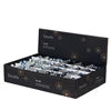 Open black box displaying multiple blue glass baubles on wire, each about 2cm in diameter.